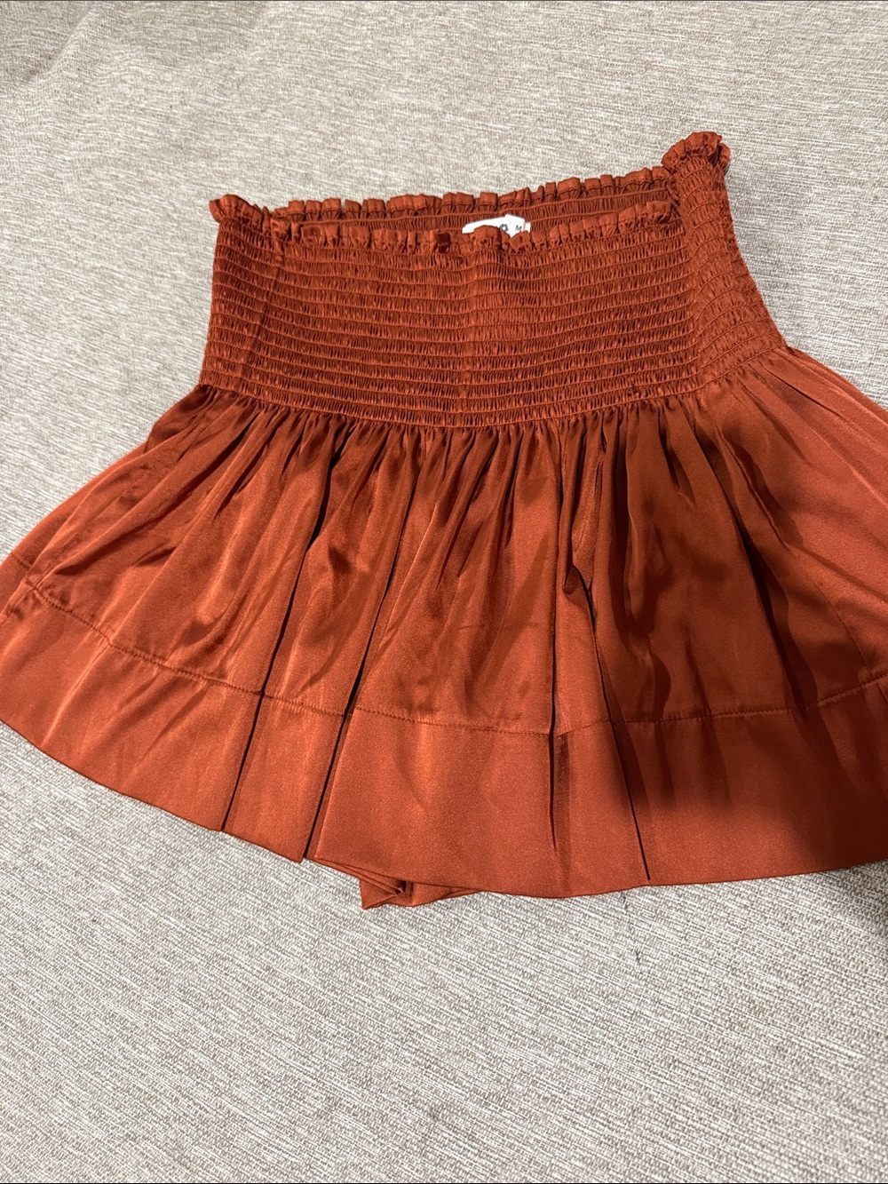 Natural life burnt orange smocked daisy skort